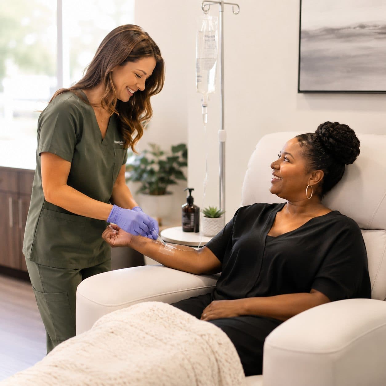 Recovery Room nurse caring for a client during her IV treatment